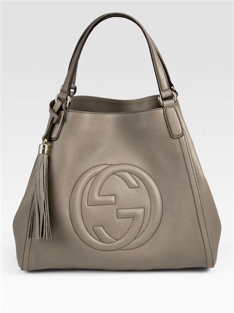 gray gucci purse|Gucci bag black and white.